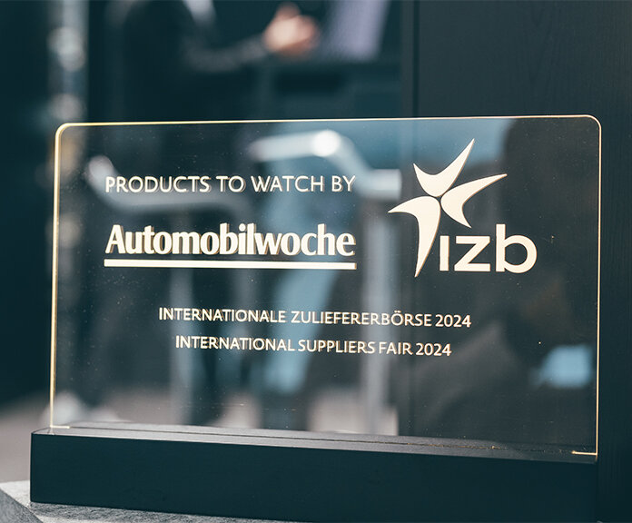 Schild Automobilwoche izb | Sandler Group