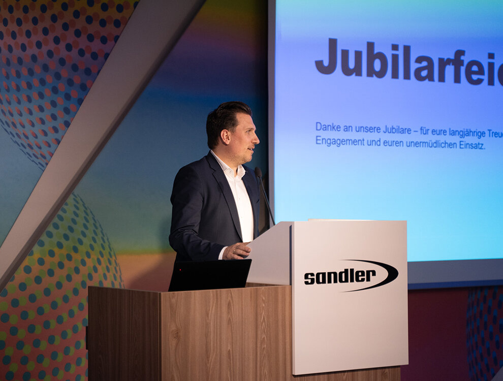 Philipp Ebbinghaus, CEO of the Sandler Group during a speech at the anniversary celebration