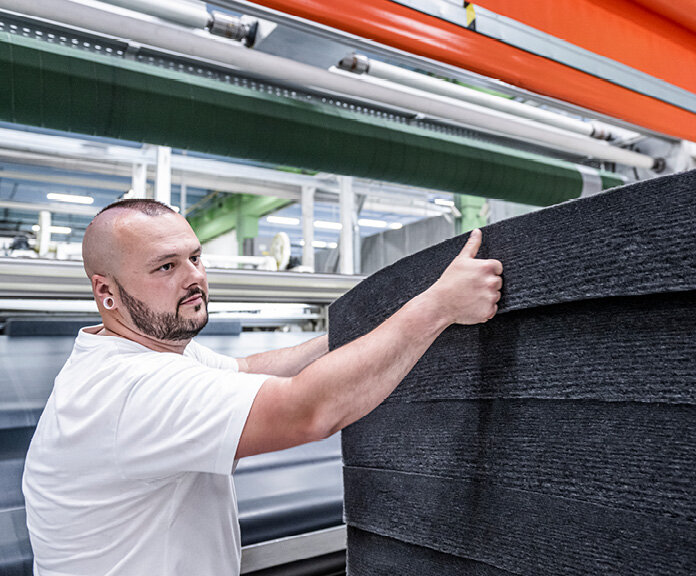 Sandler employee with nonwoven fabric