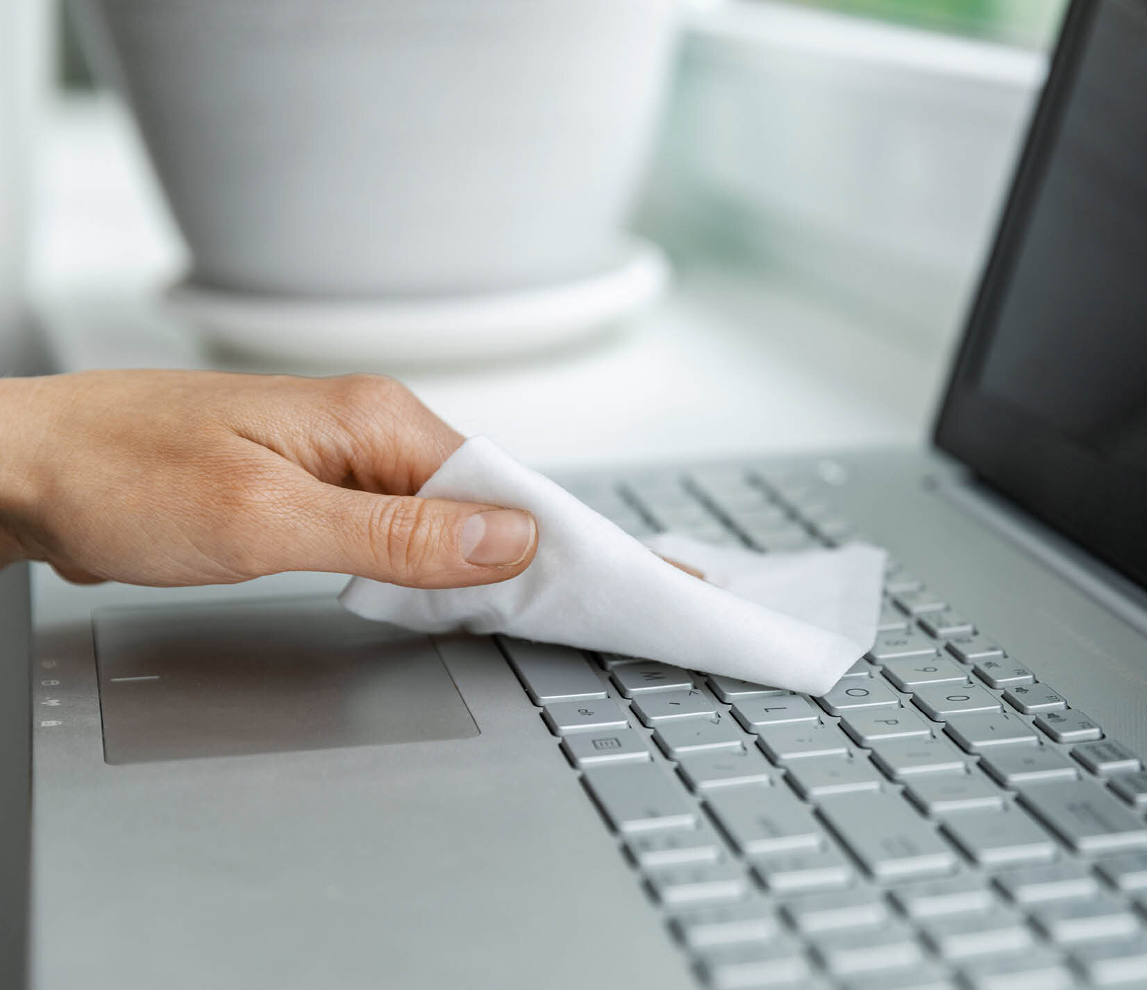 Wipe used to clean a laptop keyboard 